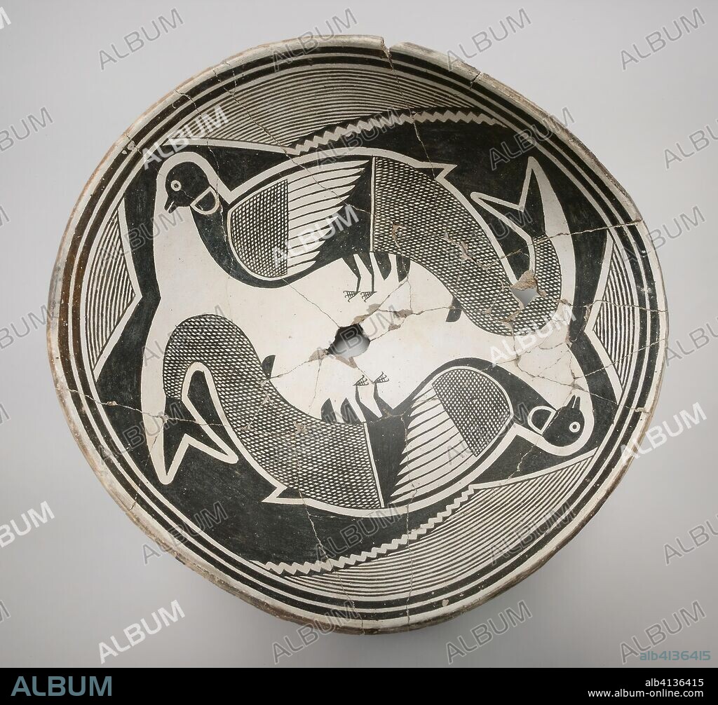 Bowl Depicting a Pair of Avian-Fish Composite Creatures. Mimbres, Style III; New Mexico, United States. Date: 1000-1300. Dimensions: 13.3 × 26.4 × 30.8 cm (5 1/4 × 10 3/8 × 12 1/8 in.). Ceramic with white and black slip. Origin: New Mexico.