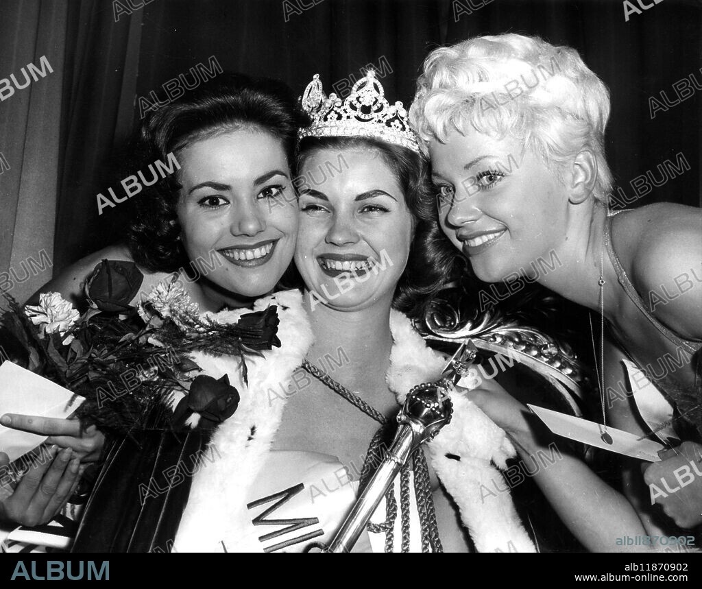 Winner of the Miss World 1958 contest , Penelope Anne Coelen (centre) , 18 year old Miss South Africa is congratulated by Claudine Oger (left) , 17 year old Miss France , who was second , and Vinnie Ingemann , 18 year old Miss Denmark , who gained third place , after the judging at the Lyceum , The Strand , London , England . Twenty two countries were represented in the competition . First prize is Â£500 and a sports car . 13 October 1958.