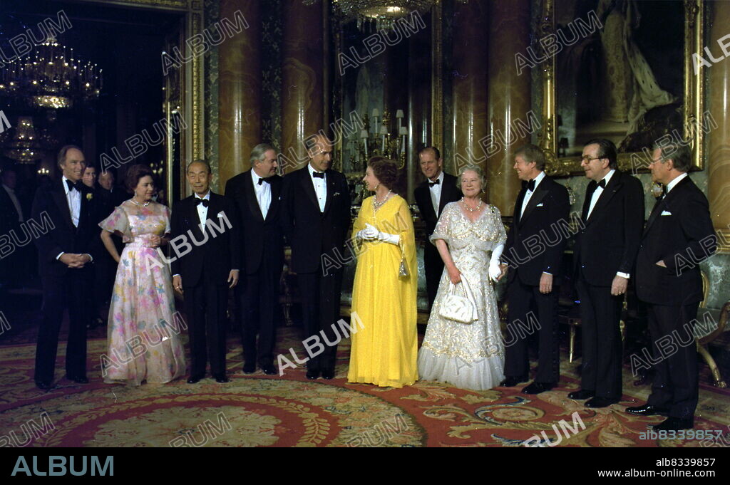 National leaders and royalty in London, 1977. Left to right: Pierre Trudeau, (Prince Charles far background), Princess Margaret, Takeo Fukuda, James Callaghan, Valery Giscard d'Estaing, Queen Elizabeth II, Prince Philip, Queen Elizabeth The Queen Mother, Jimmy Carter, Giulio Andreotti, Helmut Schmidt. Part of the 1977 G7 meeting.