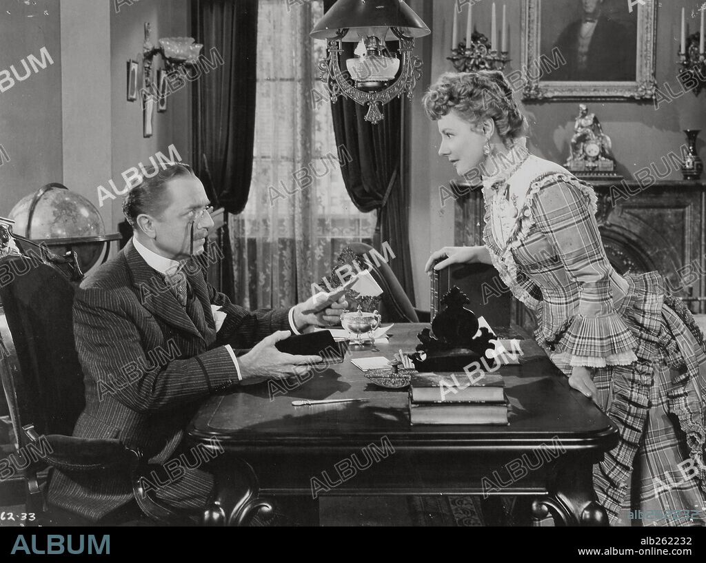 IRENE DUNNE and WILLIAM POWELL in LIFE WITH FATHER, 1947, directed by MICHAEL CURTIZ. Copyright WARNER BROTHERS.
