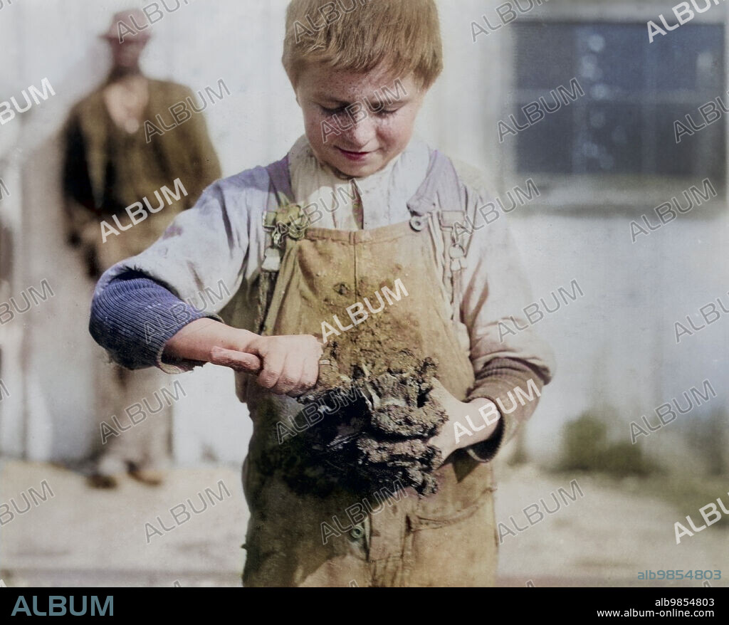 Young Oyster Shucker, Varn & Platt Canning Company, Bluffton, South Carolina, USA, Lewis Wickes Hine, February, 1913.
