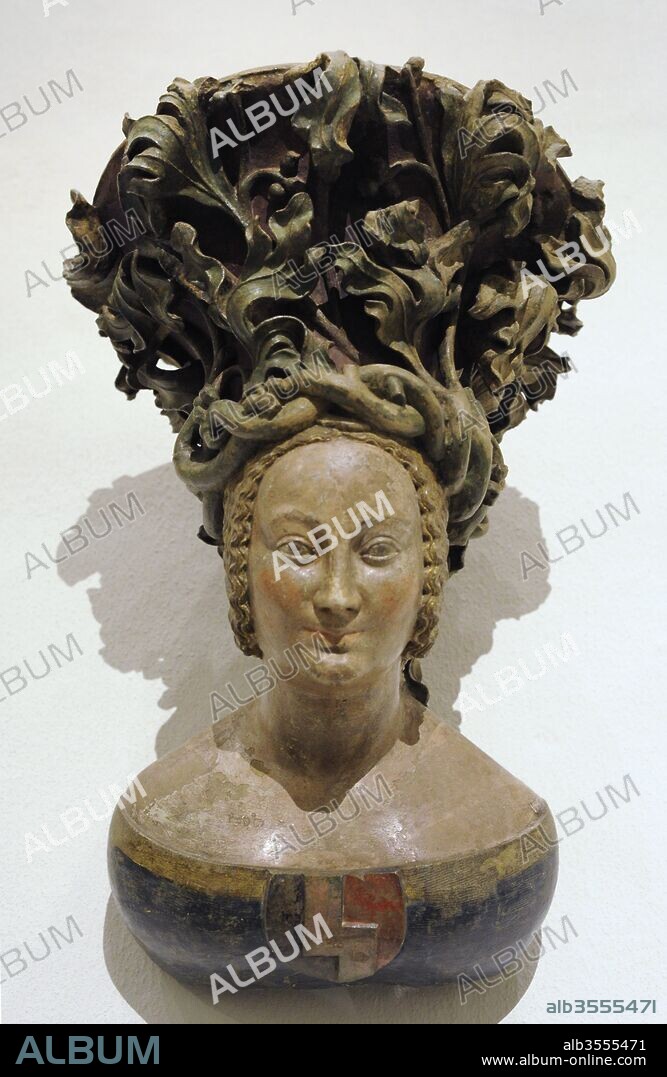 Ménsula. Busto femenino con cresta de estilo Parler. Realizado en un taller de los Parlers de Colonia, Alemania, 1390. Piedra arenisca, policromada. Museo Schnütgen. Colonia, Alemania.