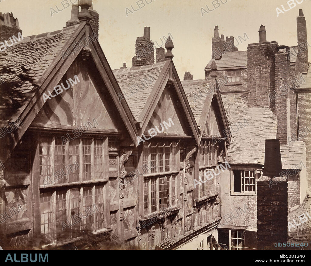 Derby House, Chester, Augustus Kelham, active 18651880, British, ca. 1864, Albumen print from wet collodion negative on thin, smooth, cream wove paper, Sheet: 7 × 8 3/4 inches (17.8 × 22.2 cm) and Mount: 12 1/2 × 16 7/8 inches (31.8 × 42.9 cm), architectural subject, chimneys, gables (architectural elements), houses, roofs, windows, Cheshire, Chester, England, Stanley Palace.
