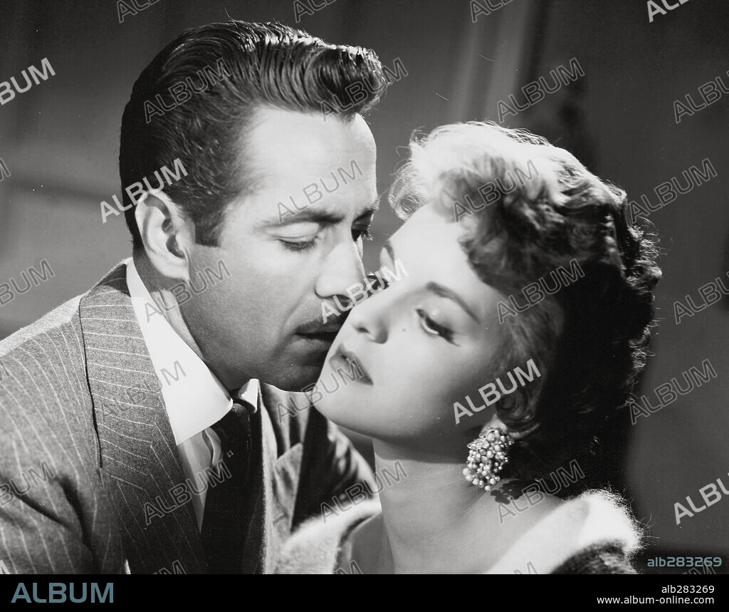 ARIADNA WELTER and ERNESTO ALONSO in THE CRIMINAL LIFE OF ARCHIBALDO DE LA CRUZ, 1955 (ENSAYO DE UN CRIMEN), directed by LUIS BUÑUEL. Copyright ALIANZA CINEMATOGRAFICA, S.A.