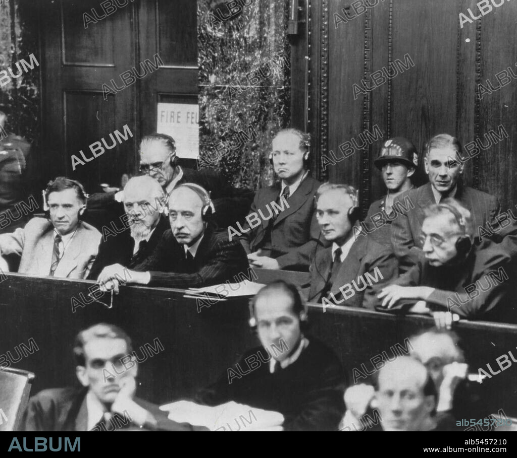 Mixed Verdict ends Long Trial of Farben Official -- I.G. Farben chemical trust directors sit in dock at Nuremberg, Germany, during 11-month trial which ended today with verdict that none of 24 on trial were guilty of backing Hitler's war of conquest but that 9 of them were guilty of looting industries in subjugated countries. In dock (left to right) front, are: Karl Krauch, Farben chairman, not guilty; Hermann Schmitz, guilty of looting; Georg Von Schnitzler, guilty; Fritz Gajewski, innocent, and Heinrich Hoerlein, innocent. Rear (left to right) are: Paul Harfliger, Max Ilgner and Friedrich Jaehne, all guilty of looting. July 29, 1948.