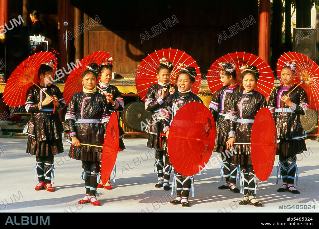 The Dong, a Kam-Sui people of southern China, are one of the 56 ethnic groups officially recognized by the People's Republic of China. They are famed for their native-bred Kam Sweet Rice, carpentry skills, and unique architecture, in particular a form of covered bridge known as the 'wind and rain bridge'. The Dong people live mostly in eastern Guizhou, western Hunan, and northern Guangxi provinces. Small pockets of Dong speakers are also found in Tuyen Quang province, northern Vietnam. Nanning was originally founded during the Yuan Dynasty (1271 - 1368), although there was a county seat here called Jinxing as far back as 318 CE. Opened to foreign trade by the Chinese in 1907, Nanning grew rapidly. From 1912 to 1936 it was the provincial capital of Guangxi, replacing Guilin. Due to its proximity to the Vietnamese border Nanning became a major centre for supplying Ho Chi Minh's North Vietnam during the Second Indochina War (Vietnam War).