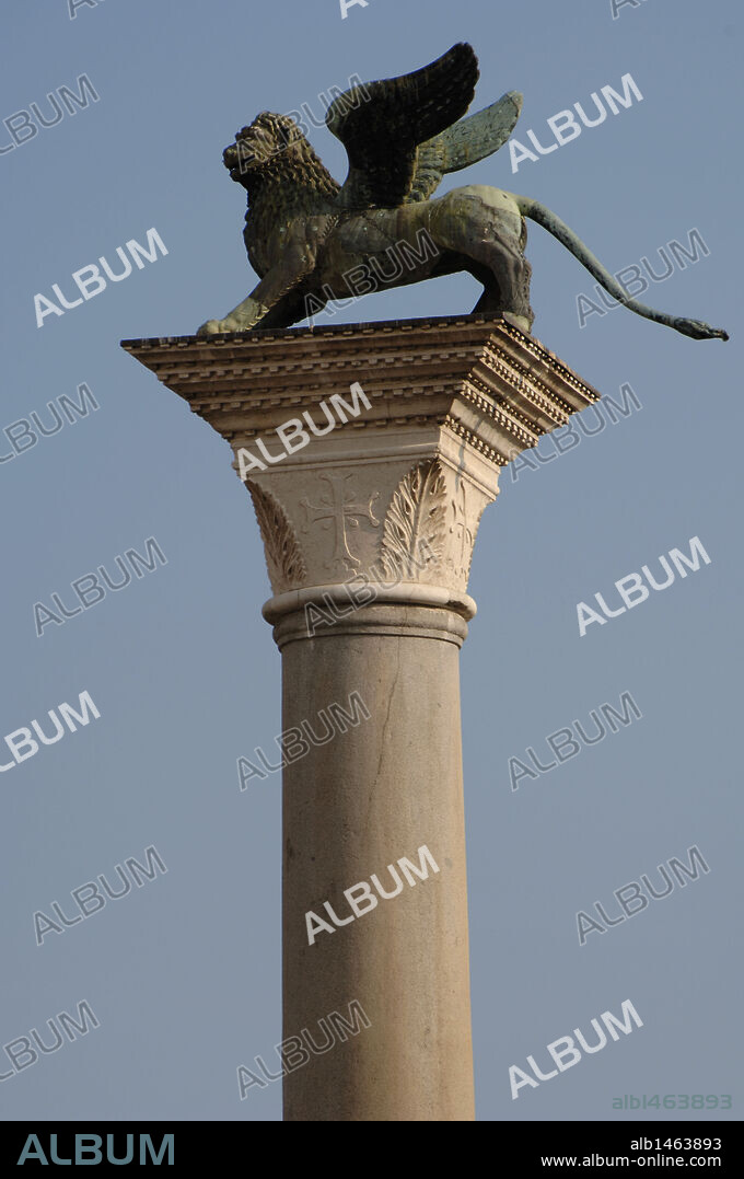 Winged lion statue of Saint Mark on a granite column in the Piazzetta. Venice. Italy.