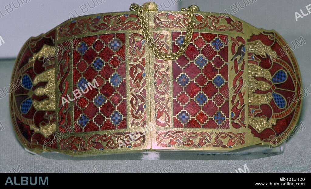 Shoulder clasp from the ship-burial at Sutton Hoo, Anglo-Saxon, early 7th century. The decoration consists of four panels with geometric stepped cell-work within borders of animal ornament, executed in garnet cloisonné, chequerboard millefiori and opaque blue glass. From the British Museum.