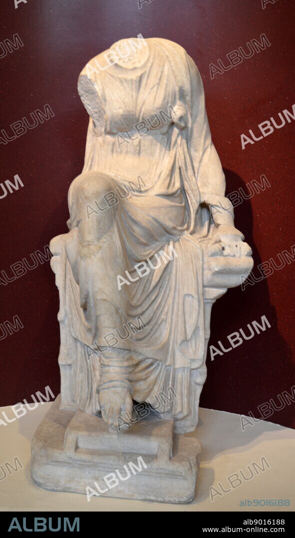 Marble statue of a seated muse. This is Clio, the muse of history who holds a scroll in her left hand. Roman, AD 1-200.