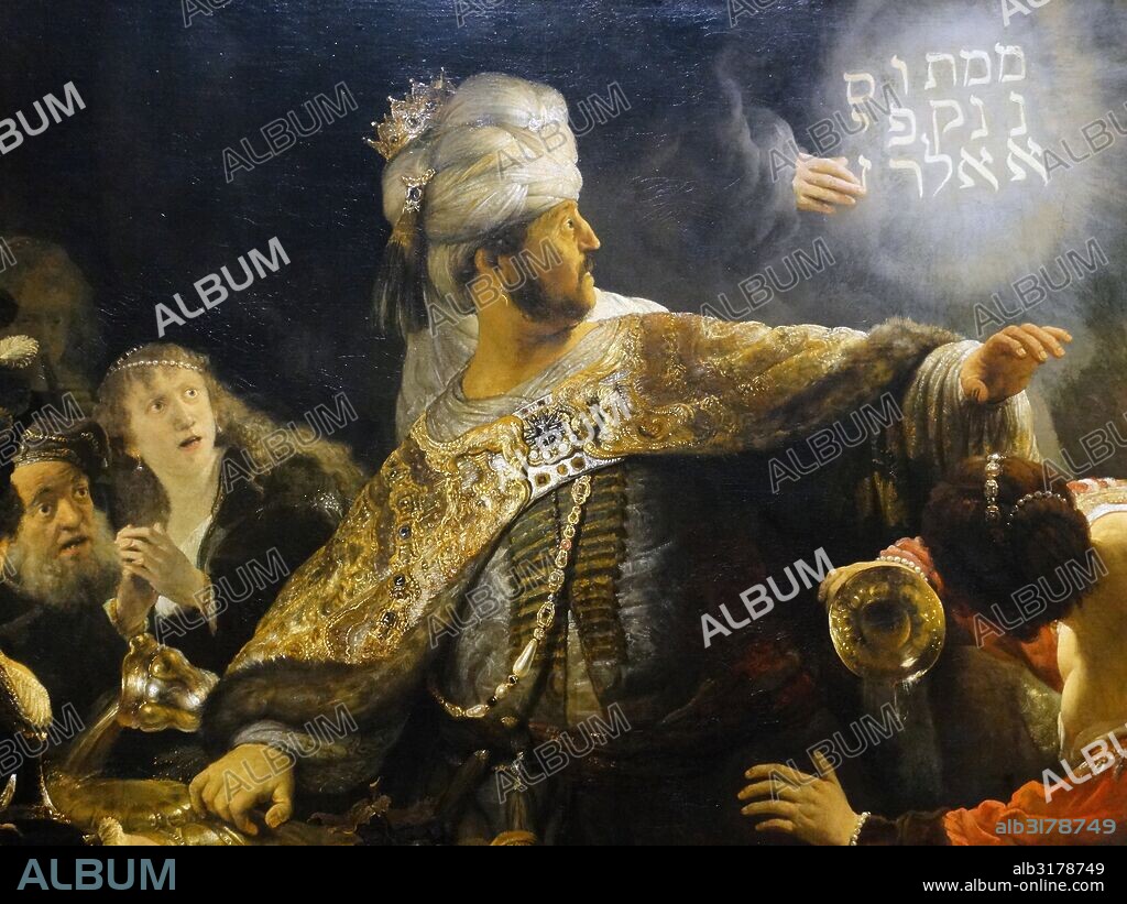 Deatil from Belshazzar's Feast 1635; painting by Rembrandt van Rijn 1606 - 1609. The story of Belshazzar and the writing on the wall originates in the Old Testament Book of Daniel. The Babylonian king Nebuchadnezzar looted the Temple in Jerusalem and has stolen the sacred golden cups. His son Belshazzar used these cups for a great feast where the hand of God appeared and wrote the inscription on the wall prophesizing the downfall of Belshazzar's reign.