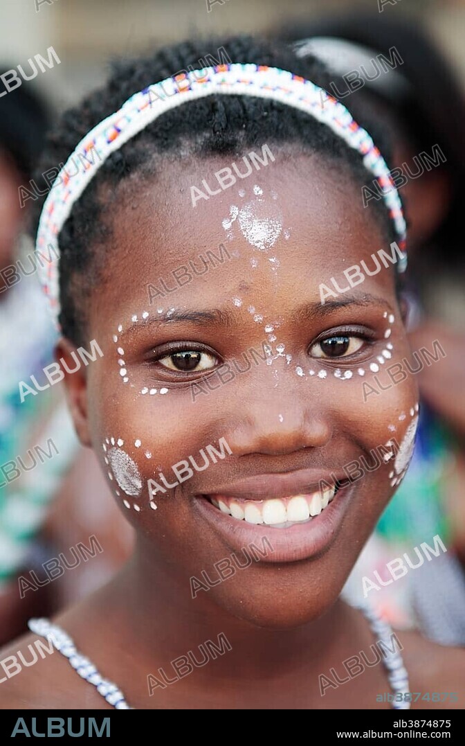 Portrait of Xhosa girl with traditional adornment, Grahamstown, Eastern Cape, South Africa, Africa.