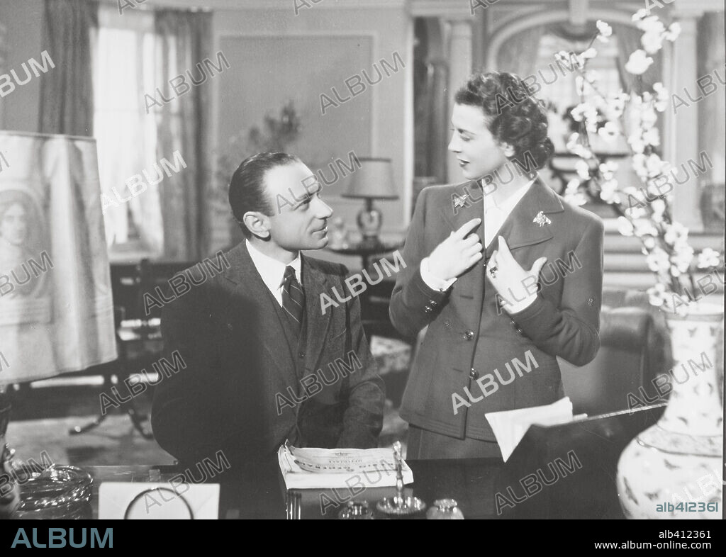 RENEE SAINT-CYR and UMBERTO MELNATI in RED ROSES, 1940 (ROSE SCARLATTE), directed by VITTORIO DE SICA. Copyright AMATO-ERA FILM.
