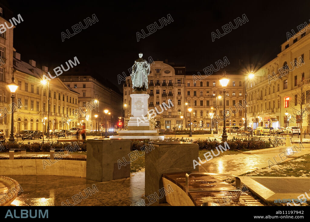 Jozsef Nador Ter Palatine Square at night with buildings and Joseph Archduke of Austria and Hungary statue, Budapest, Hungary, Europe.