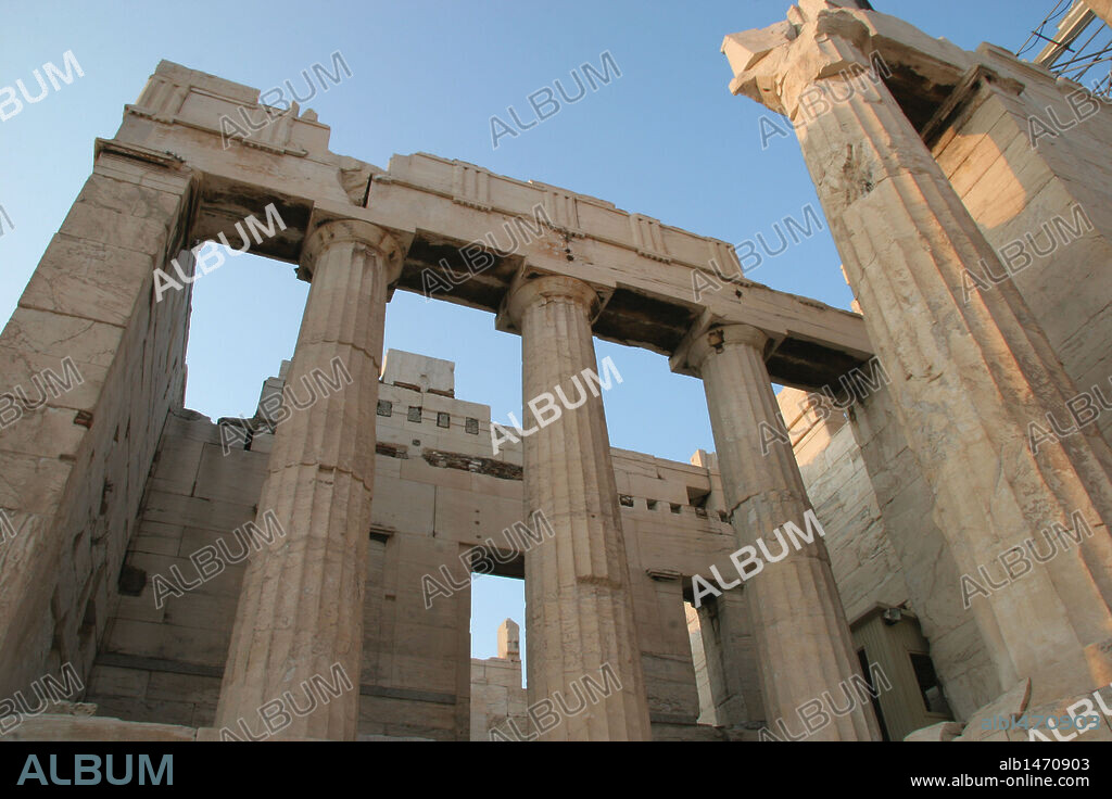 Greek Art. The Propylaea. In 437 BC Mnesicles started building the monument gates with columns of Pentelic marble. (437-432 BC). Acropolis. Athens. Attica. Central Greece. Europe.