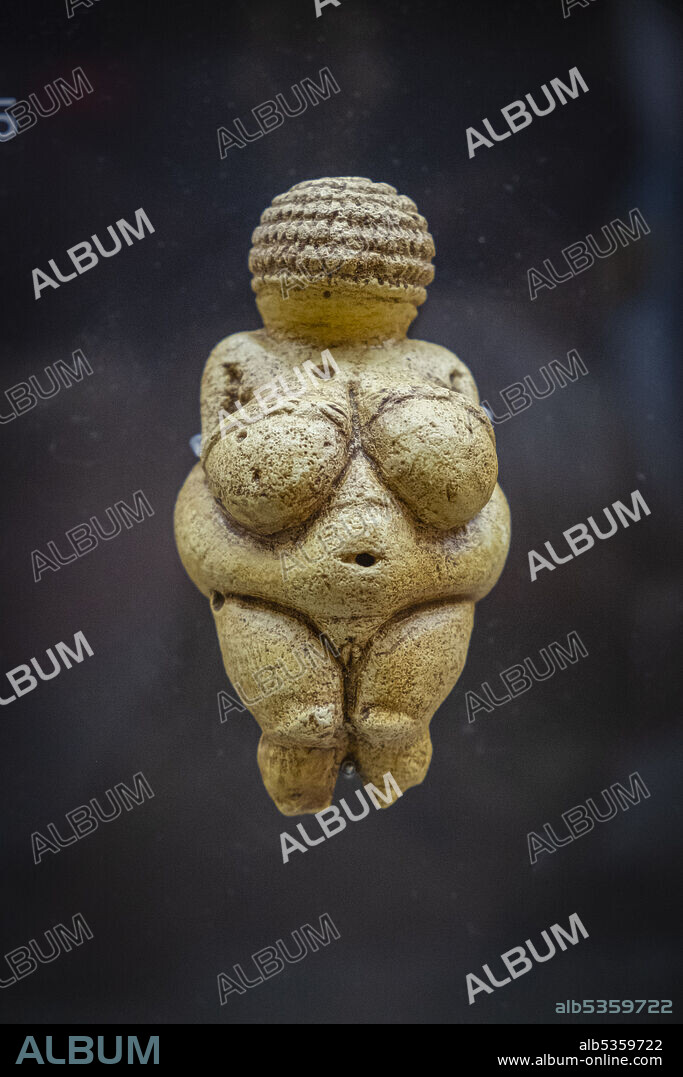Venus of Willendorf, female limestone figurine, Gravetian Upper Paleolithic, Museo de la evolución humana, MEH, Burgos , Spain.