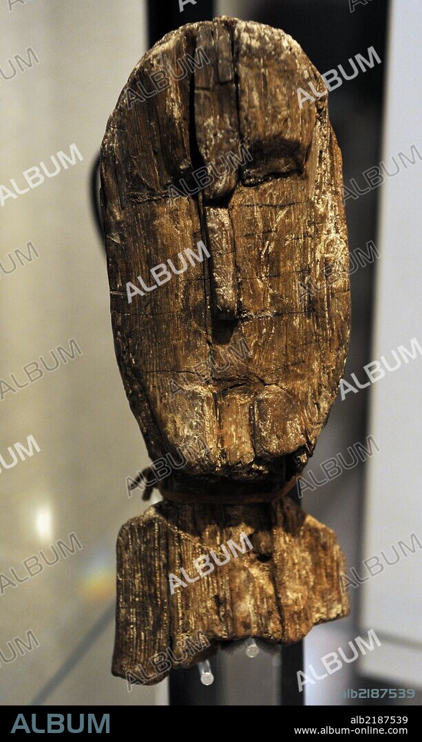 The wooden idol from Pohjankuru. Southern Finland, dates from ca. 3000 BC and is the oldest known portrait of an inhabitant of Finland. The National Museum of Finland. Helsinki.