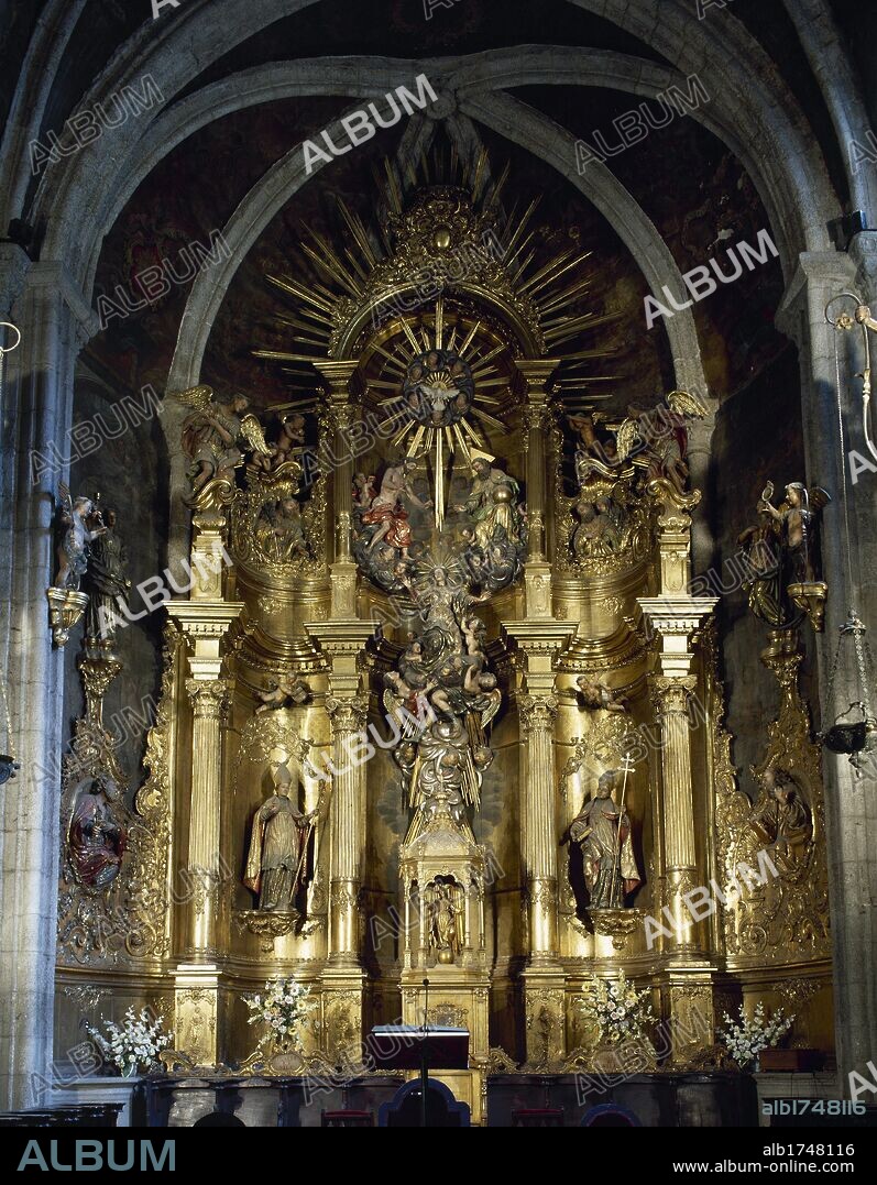 Spain, Galicia, province of Lugo, Mondo–edo. The Cathedral. Main altarpiece, 1769. Author: Fernando de Teran (18th century. Rococo style. Virgin accompanied by angels that lead to the Trinity. On the sides, statue of St. Rudesind and st. Martin of Braga.