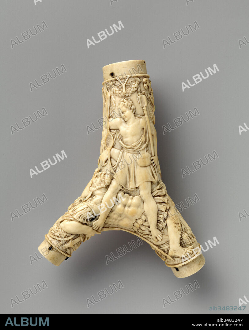 Powder Flask, ca. 1570, French, Antler, iron, 17 9/16 x 5 11/16 x 1 3/4 (19.2 x 14.5 x 4.5 cm); Wt. 8.15 oz. (231 g), Firearms Accessories-Flasks & Primers, The consummate works of an anonymous French artist, this flask is made of polished antler, and expertly carved at the front. Whereas the latter sports the heraldic arms and personal emblem of its noble owner, this flask features a scene from the Old Testament, Samson’s victory over the giant Goliath.