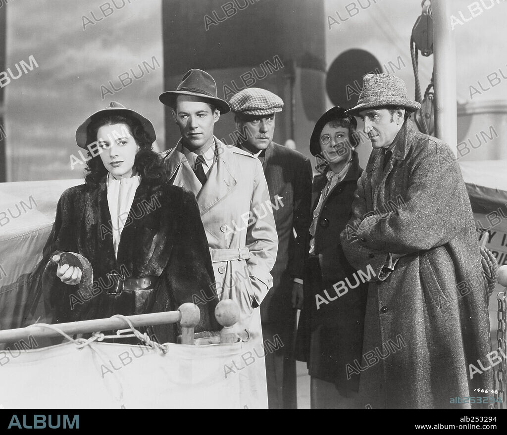 BASIL RATHBONE, MARJORIE RIORDAN, NIGEL BRUCE and ROSALIND IVAN in PURSUIT TO ALGIERS, 1945, directed by ROY WILLIAM NEILL. Copyright UNIVERSAL PICTURES.