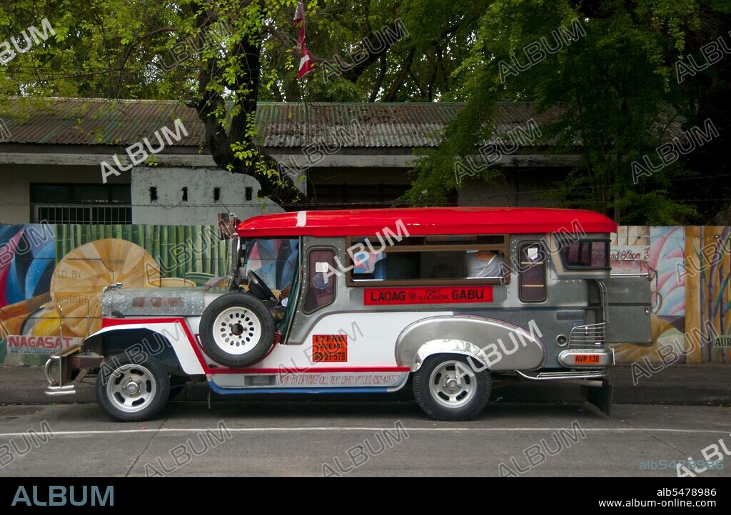 Jeepneys are the most popular means of public transportation in the Philippines. They were originally made from US military jeeps left over from World War II and are known for their flamboyant decoration and crowded seating. They have become a ubiquitous symbol of Philippine culture. Laoag (Ilocano for 'light or clarity'), is an old, flourishing settlement known to Chinese and Japanese traders when the Spanish conquistador Juan de Salcedo arrived at the northern banks of Padsan River in 1572. Augustinian missionaries established the Roman Catholic Church in the area in 1580 and designated Saint William, the Hermit as its patron saint.