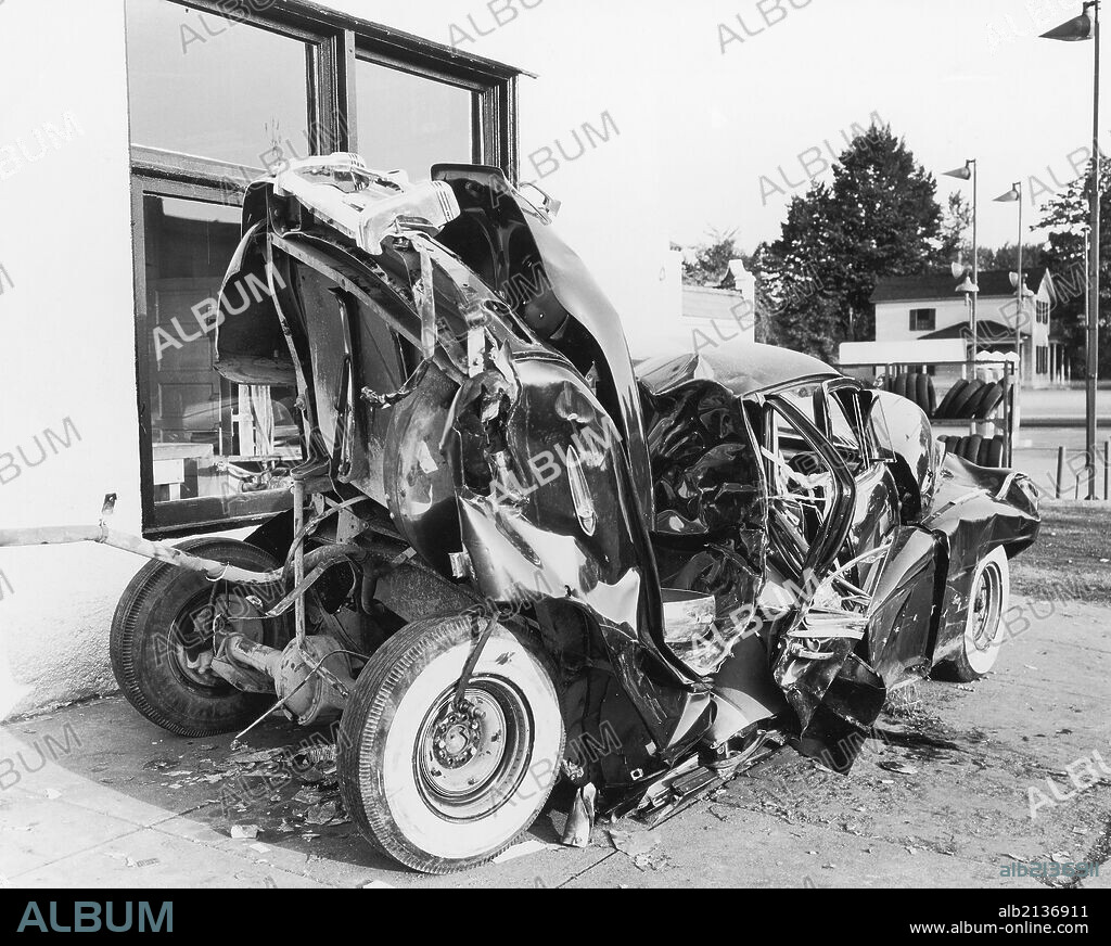 Car accident, 1950s-60s, black and white.