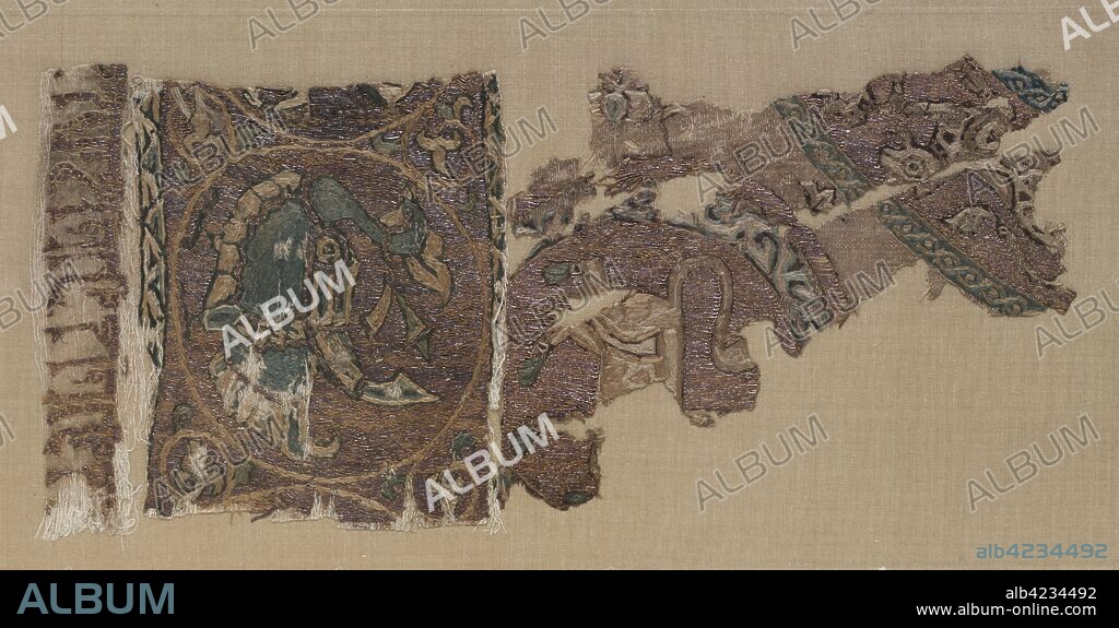 Embroidered border and field of animals in large roundels, 1000s-1100s. Iraq, probably Baghdad, Seljuk period. Plain weave: silk warp and cotton weft (mulham); embroidery, couched, split, running, and outline stitches: silk and gold thread; overall: 40 x 26 cm (15 3/4 x 10 1/4 in.).