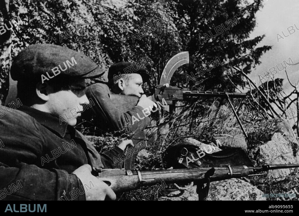 WW2: Russian partisans in ambush positions. Pskov region, 1941. The Great Patriotic War, 1941-45.