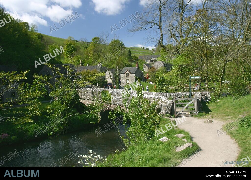 Milldale, Dovedale, Derbyshire. Much of this scenic limestone valley in the Peak District is owned and managed by the National Trust. The area is very popular with walkers.