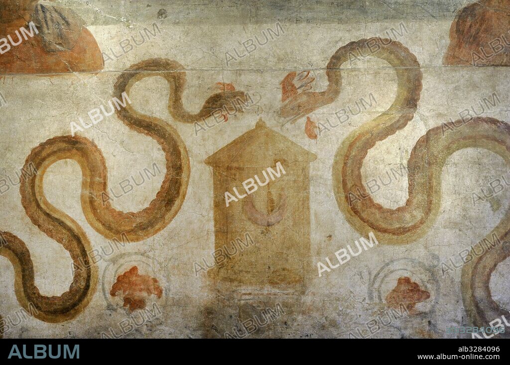 Two serpent are moving towards a basket which has a crescent moon symbol on it. North wall. The Sacrarium. Temple Isis. Pompeii. Italy. National Archaeological Museum, Naples. Italy.