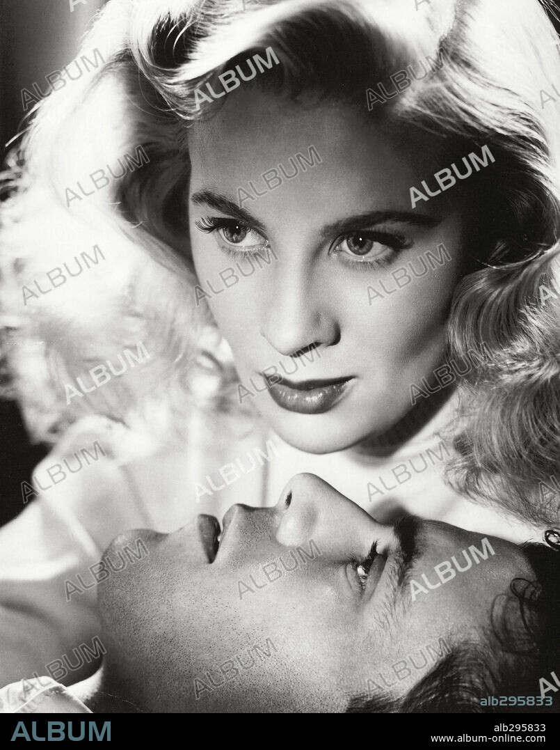 DIRK BOGARDE and MAI ZETTERLING in DESPERATE MOMENT, 1953, directed by COMPTON BENNETT. Copyright RANK.