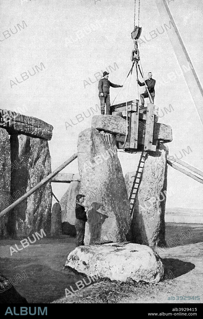 Lifting of an impost at Stonehenge, 1901, (c1920). Restoration of the ancient monument. The Stonehenge complex on Salisbury Plain in Wiltshire evolved in a series of stages between about 3100 and 1600 BC. The great Neolithic Sarsen circle was erected between 2500 and 2000 BC. Illustration from Story of the British Nation, Volume I, Walter Hutchinson, (London, c1920s).
