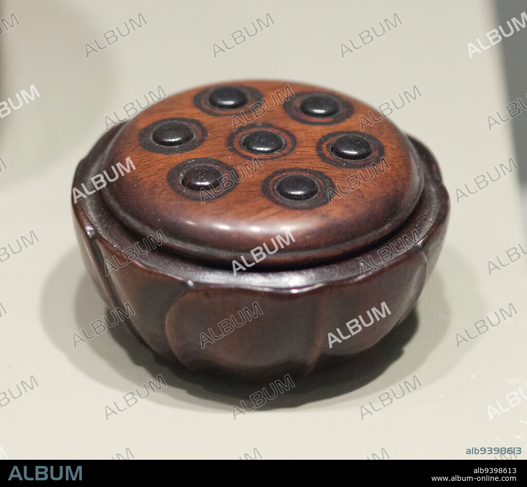 Cricket Box, 18th century, 1 1/2 x 2 1/2 x 2 1/2 in. (3.81 x 6.35 x 6.35 cm) (closed, overall), Hung-mu hardwood, China, 18th century, This unusual container is crafted in the general shape of a lotus pod with stylized petals on the side. The removable lid is carved with small, round openings which acted as air vents for the crickets that were kept within. Gourd and wooden cricket containers were generally used during the cooler months.