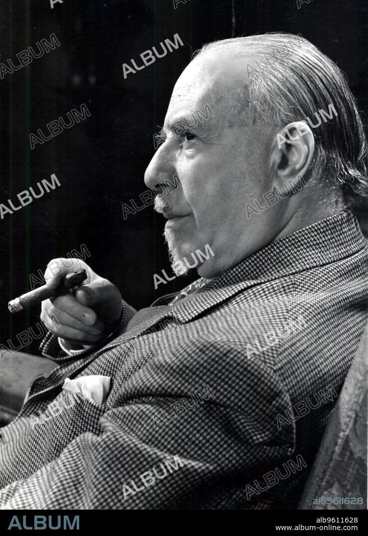Thomas Beecham (1879-1961), English conductor and impresario. Beecham, seen here holding a cigar, founded the New Symphony Orchestra, the London Philharmonic Orchestra and the Royal Philharmonic Orchestra. Photograph by courtesy of EMI.