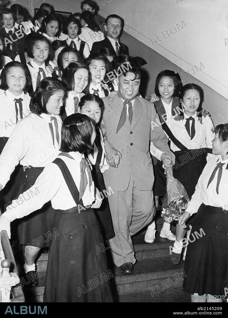 Kim il sung of north korea in dresden, gdr with a group of young korean pioneers, june 10, 1956.