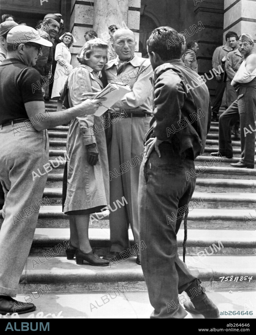 MICHAEL CURTIZ, NANCY OLSON and WILLIAM HOLDEN in FORCE OF ARMS, 1951, directed by MICHAEL CURTIZ. Copyright WARNER BROTHERS.