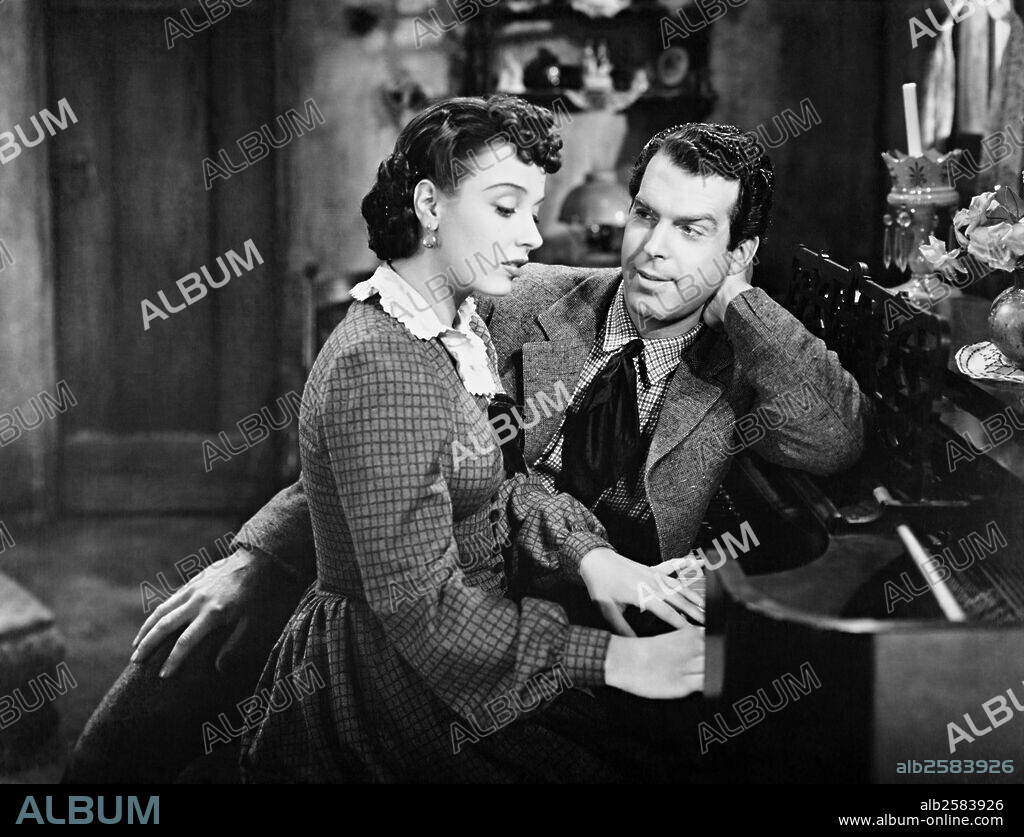 FRED MACMURRAY et PATRICIA MORISON dans RANGERS OF FORTUNE, 1940, réalisé par SAM WOOD. Copyright PARAMOUNT PICTURES.