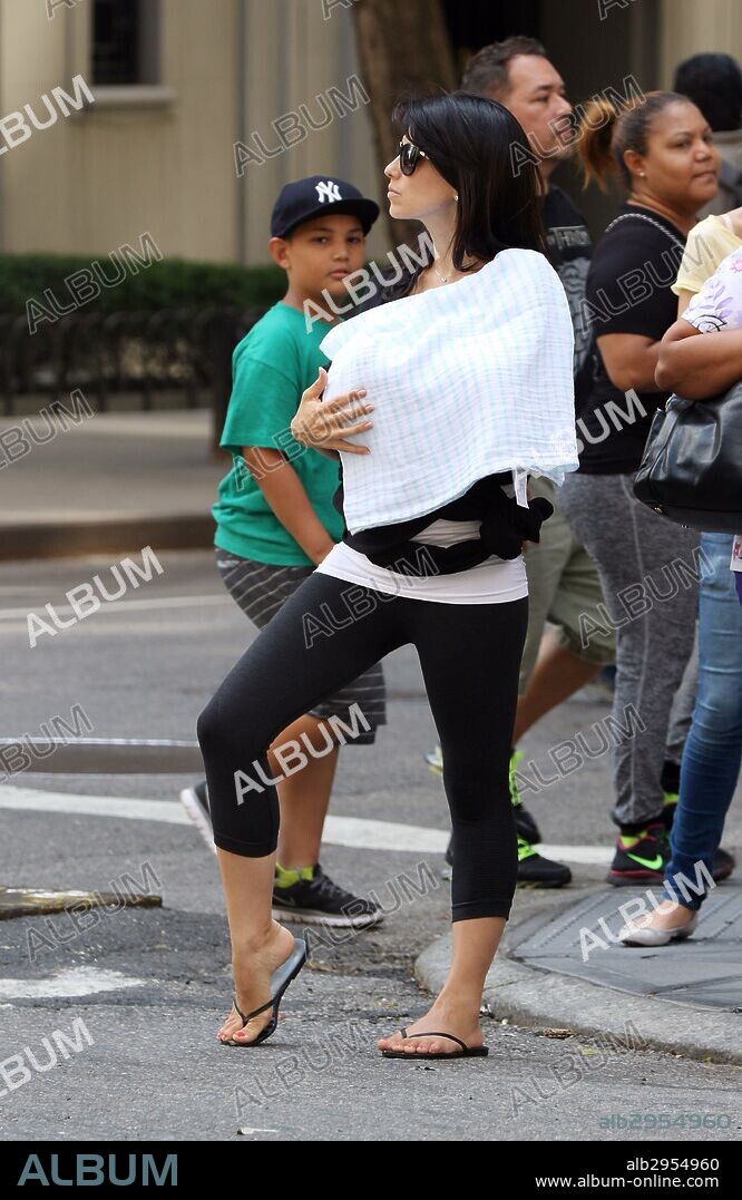 June 22, 2015 - New York City, NY, USA - Hilaria Baldwin strikes a yoga pose as she takes her new baby son Rafael Thomas Baldwin out in the East Village on June 22 2015 in New York City. 22/06/2015