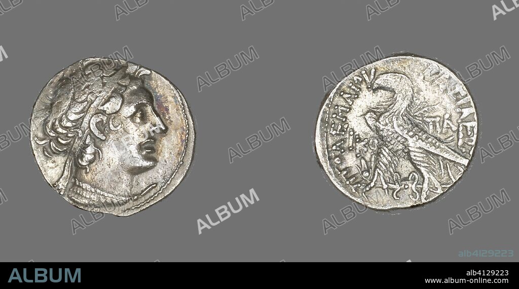 ANCIENT GREEK. Tetradrachm (Coin) Portraying King Ptolemy I. Greco-Egyptian. Date: 53 BC-52 BC. Dimensions: Diam. 2.6 cm; 14.06 g. Silver. Origin: Egypt.