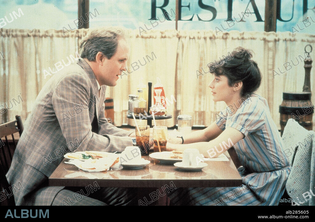 DEBRA WINGER and JOHN LITHGOW in TERMS OF ENDEARMENT, 1983, directed by JAMES L. BROOKS. Copyright PARAMOUNT PICTURES.