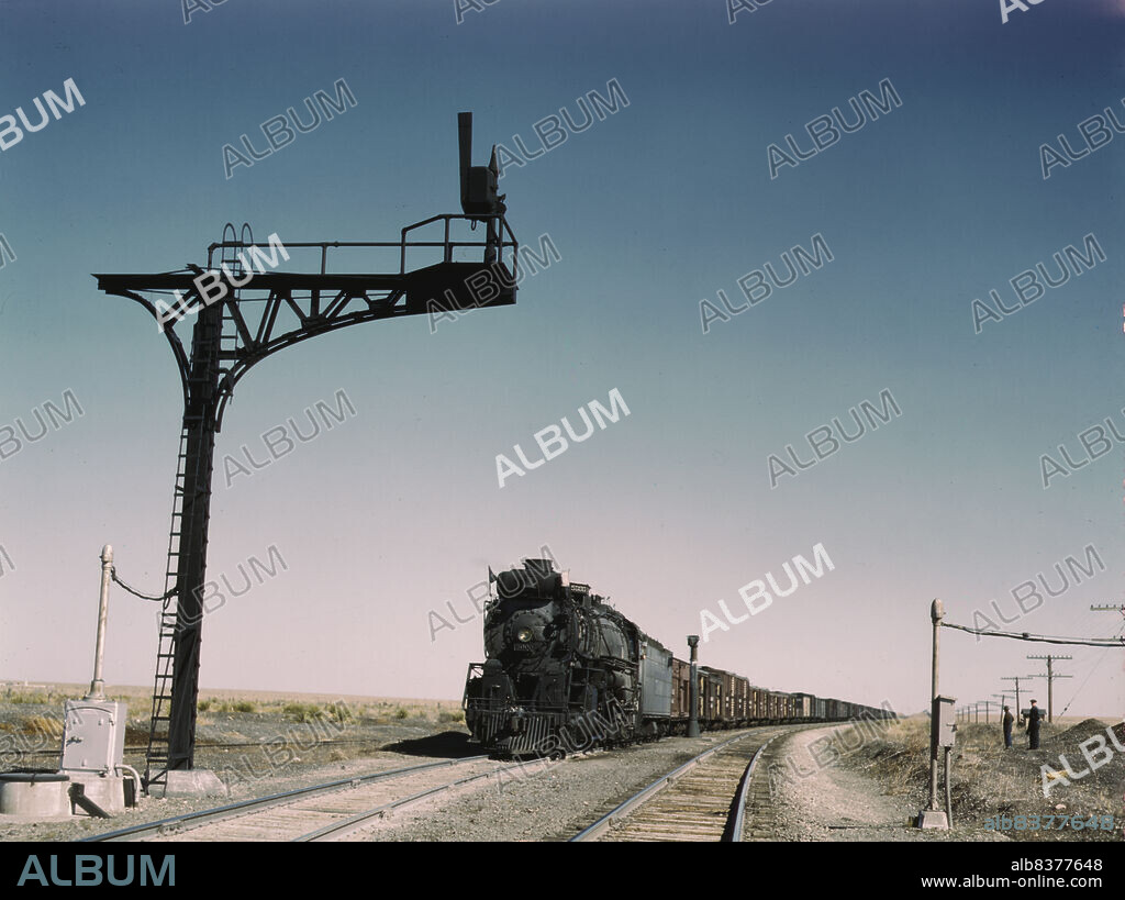 JACK DELANO. West bound Santa Fe R.R. freight train waiting in a siding to meet an east bound train, Ricardo, N[ew] Mex[ico].