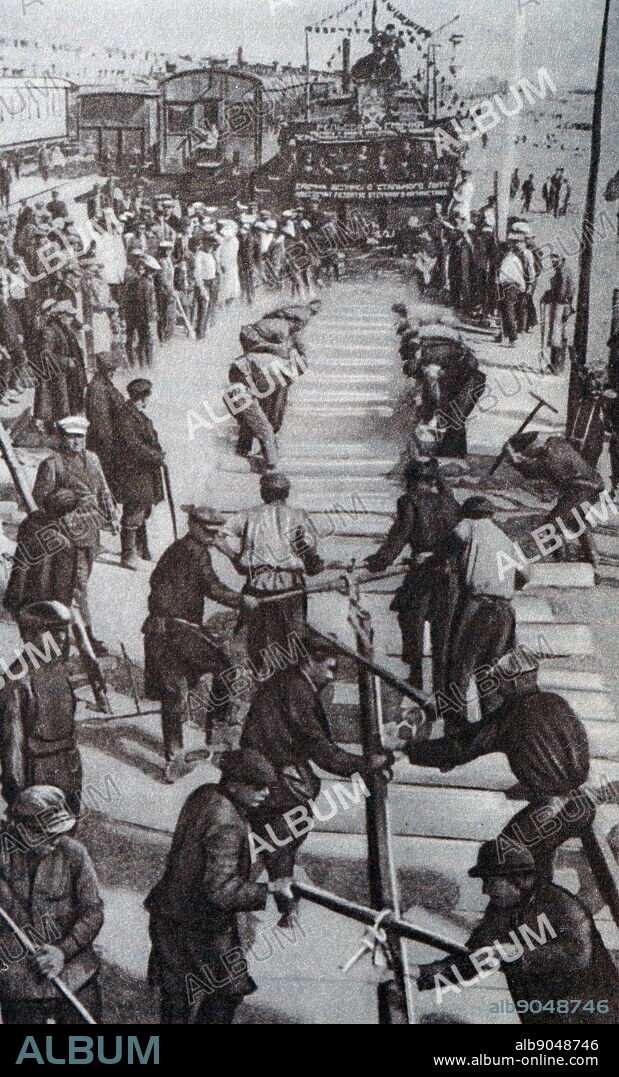 Laying the last rails on Turksib. 1930.The Turkestan-Siberian Railway (Turk-Sib) is a railway that connects Central Asia with Siberia. It starts north of Tashkent in Uzbekistan at Arys, where it branches off from the Trans-Aral Railway. It heads roughly northeast through Shymkent, Taraz, Bishkek (on a spur) to the former Kazakh capital of Almaty. The bulk of construction works was undertaken between 1926 and 1931.
