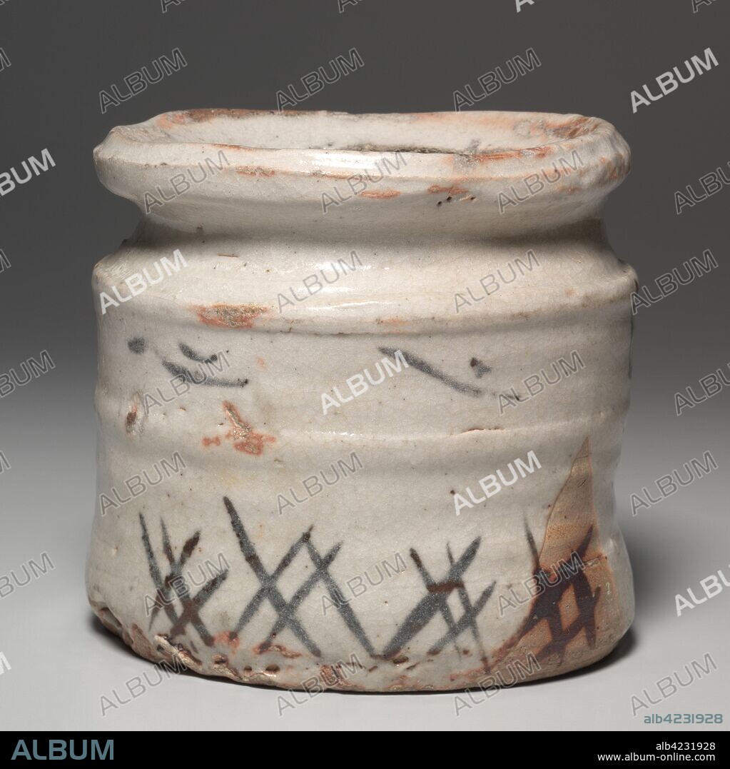 Water Container (Mizusashi) with Grasses, late 1500s–early 1600s. Japan, Momoyama period (1573-1615) to Edo period (1615-1858). Stoneware with underglaze iron oxide slip decoration (Mino ware, Shino type); diameter: 19.6 cm (7 11/16 in.); lid: 2.9 x 14.7 cm (1 1/8 x 5 13/16 in.); container: 18.4 cm (7 1/4 in.).