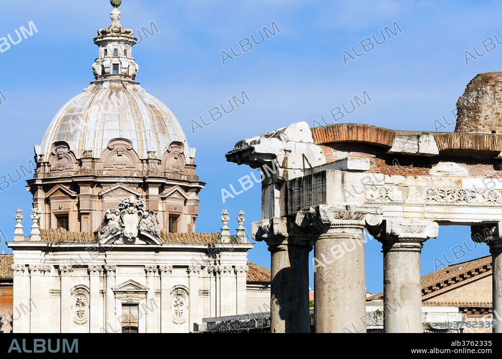 Roman Forum with Temple of Saturn, and the dome of Santi Luca e Martina behind, Rome, UNESCO World Heritage Site, Lazio, Italy, Europe.