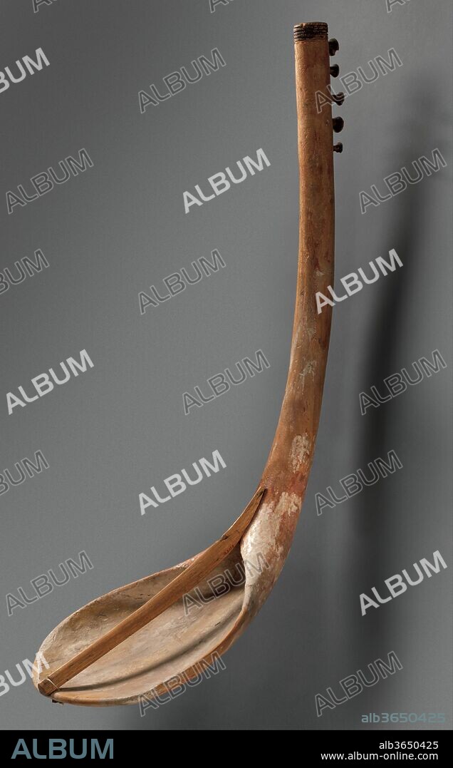 Bow harp. Dimensions: L. 81.4 cm (32 1/16 in); W. 26.4 cm (10 3/8 in.). Dynasty: Dynasty 12. Date: ca. 2030-1640 B.C..
The harp, called benet in ancient Egyptian, was one of the most popular musical instruments throughout pharaonic history. This bow harp, among the oldest to have survived, is characterized by a long, curving neck and a shovel-shaped sound box. Originally covered by parchment or animal skin, the sound box would have resonated when the instrument's five strings were plucked. Harpers played either alone or in ensembles with singers and other musicians.