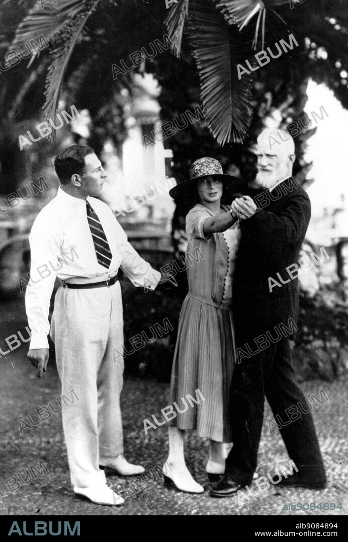 George Bernard Shaw at Reid's Madeira in 1927, taking dancing lessons from Mr and Mrs Max Rinder. George Bernard Shaw (1856-1950) was an Irish playwright and winner of the Nobel Prize for Literature in 1925. The Genius of Shaw page 157.