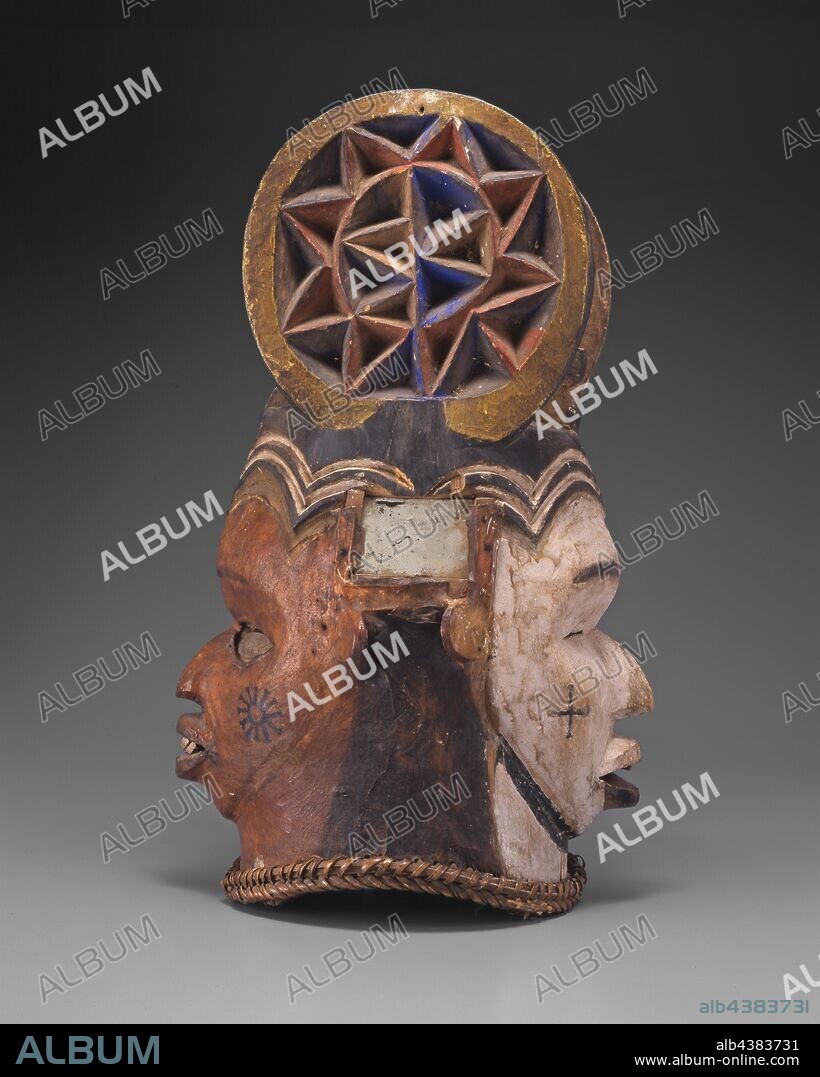 Janus-faced helmet mask, Cross River, hide, pigment, mirror, H: 19-3/4 in., African Art.