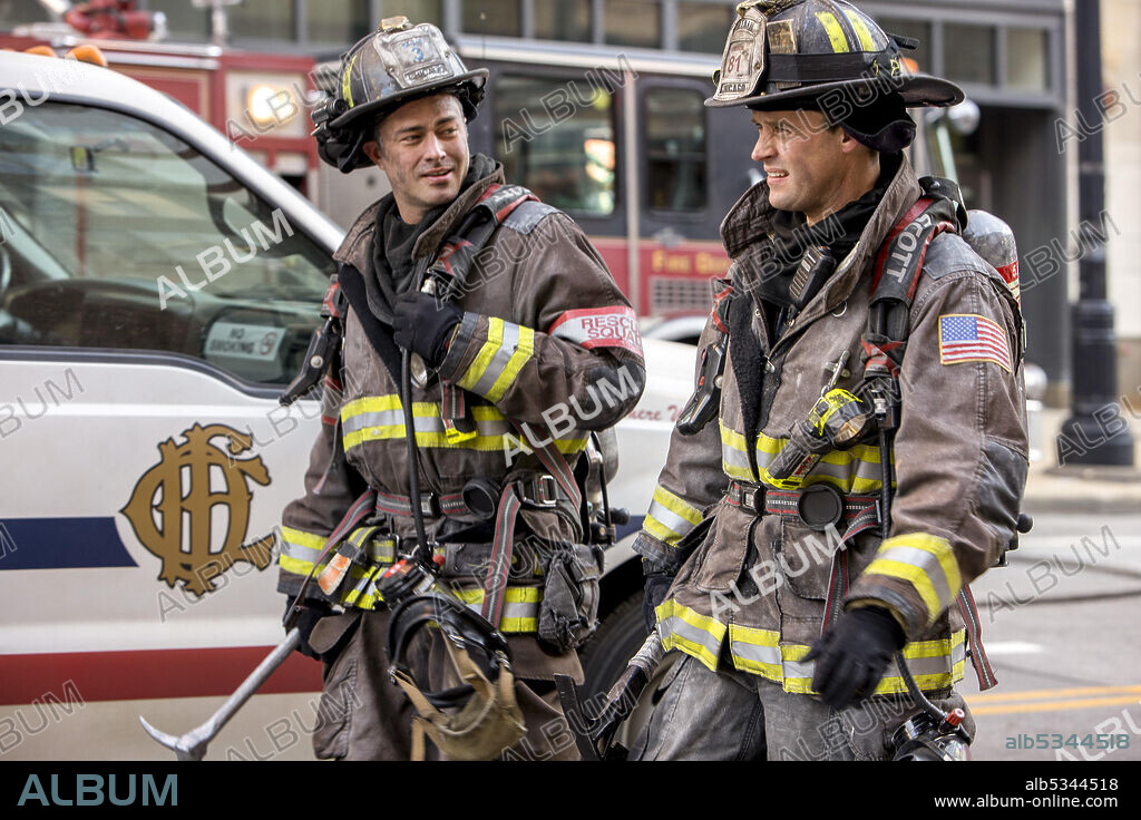 JESSE SPENCER and TAYLOR KINNEY in CHICAGO FIRE, 2012, directed by MICHAEL BRANDT, SANFORD BOOKSTAVER and STEVE SHILL. Copyright Wolf Films / Universal Pictures Television.