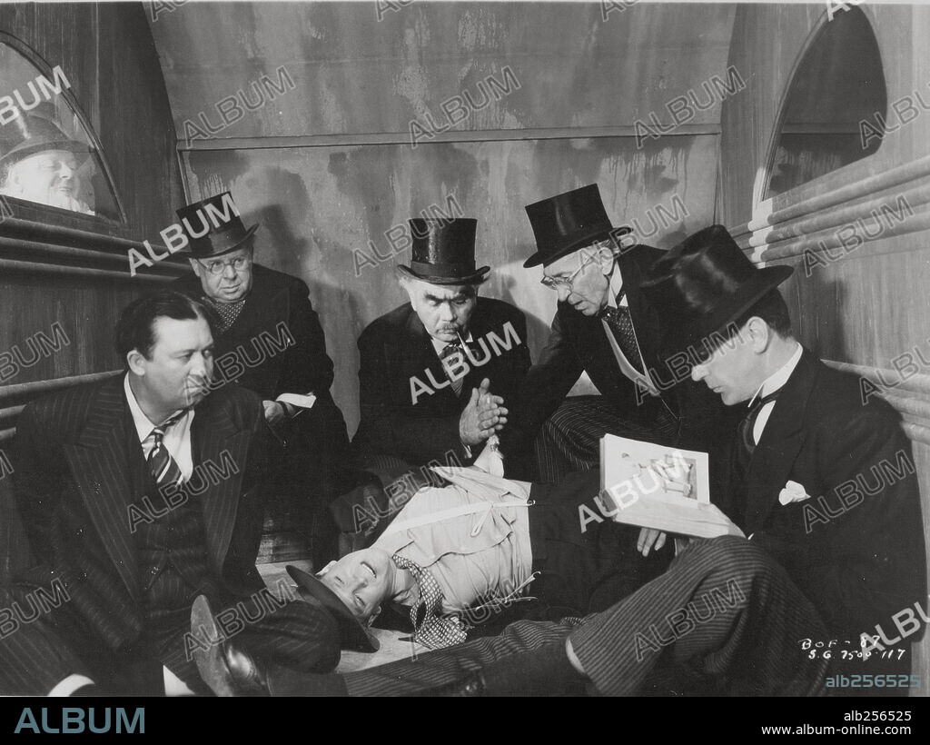 DAN DURYEA, GARY COOPER, OSCAR HOMOLKA and S. Z. SAKALL in BALL OF FIRE, 1941, directed by HOWARD HAWKS. Copyright RKO/SAMUEL GOLDWYN.