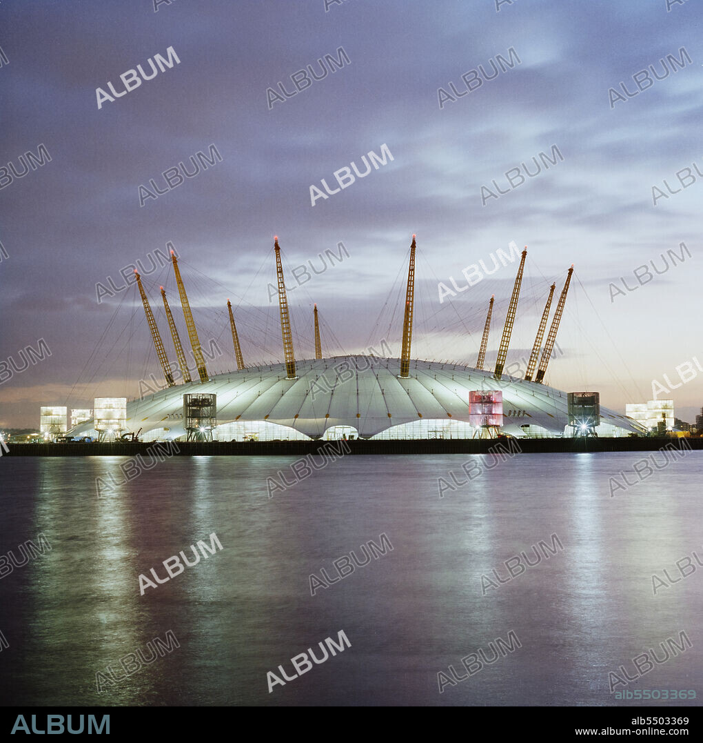 JOHN LAING PLC. Millennium Dome, Drawdock Road, Greenwich, London, 10/02/1999. An exterior view of the Millennium Dome at dusk from the north, across the Thames.