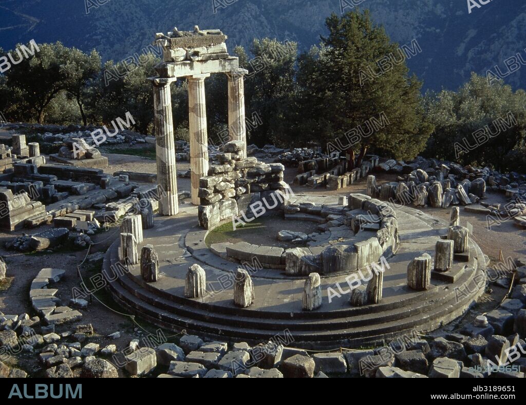 Greece. Sanctuary of the Athena Pronaia in Delphi. Tholos. Circular temple. 4th century BC. Remains of the three reconstructed Doric columns of the tholos.